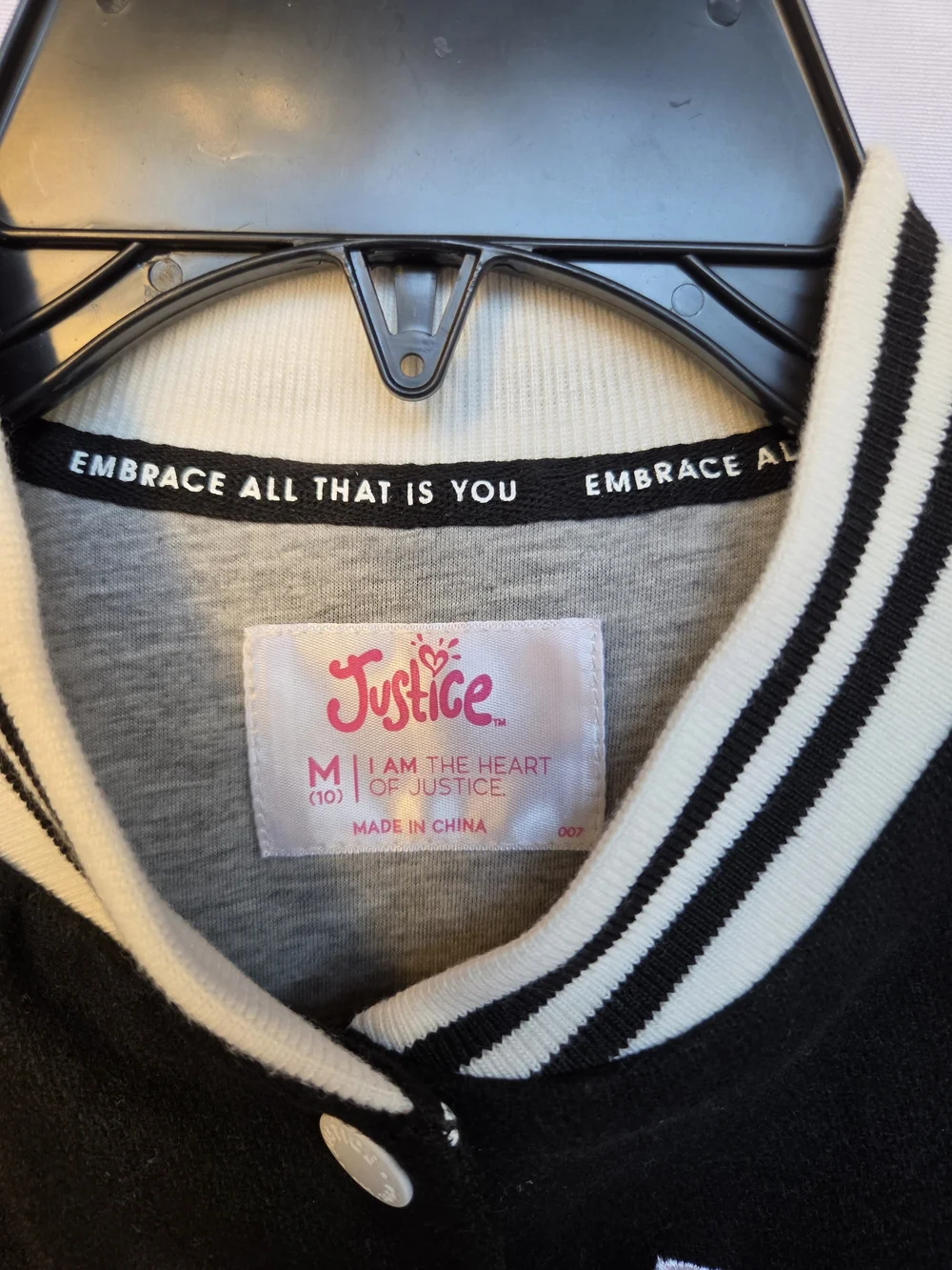 Justice black varsity